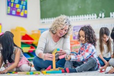 Teacher studying Educational Games to Kids